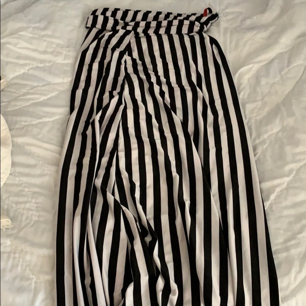 Sleeveless below the knee dress.